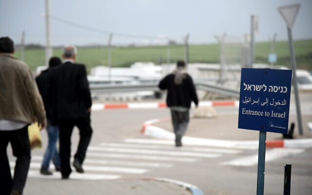 Illustrative: Palestinians from the Gaza Strip enter Israel through the Erez Crossing. (Israel Defense Forces)