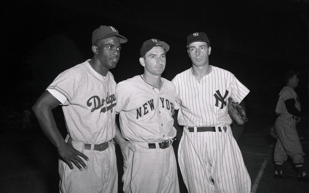 Sid Gordon, center, shown with the legends Jackie Robinson and Joe DiMaggio in 1949. (Getty Images/ via JTA)