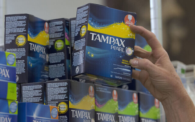 A person restocks tampons at Compton's Market, Wednesday, June 22, 2016, in Sacramento, Calif.(AP Photo/Rich Pedroncelli)