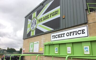 In this July 30, 2018 photo, a view of ticket office at the New Lawn, Forest Green Rovers’ football ground, in Nailsworth, England. (AP Photo/James Brook)