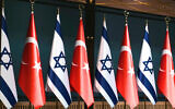 Israeli and Turkish flags from a press conference between Turkish President Recep Tayyip Erdogan, right, and Israel's President Isaac Herzog in Ankara, Turkey, March 9, 2022. (AP Photo/Burhan Ozbilici)