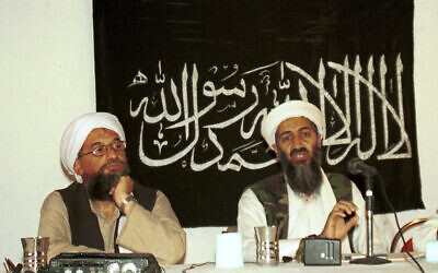 In this 1998 file photo made available March 19, 2004, Ayman al-Zawahri, left, listens during a news conference with Osama bin Laden in Khost, Afghanistan. (Mazhar Ali Khan/AP)