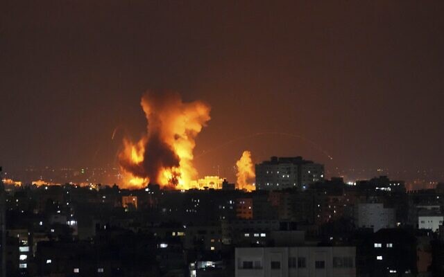Smoke rises following Israeli airstrikes on a building in Gaza City, Friday, Aug. 5, 2022 (AP Photo/Hatem Moussa)