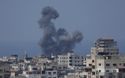Smoke rises following Israeli airstrikes on a building in Gaza City, August 6, 2022. (AP Photo/Hatem Moussa)