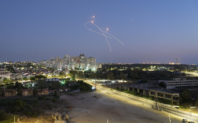 Israel’s Iron Dome anti-missile system fires to intercept rockets launched from the Gaza Strip towards Israel, in Ashkelon, August 7, 2022. (AP/Tsafrir Abayov)