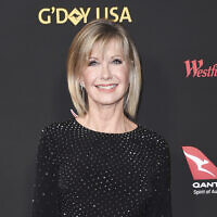 Actress and singer Olivia Newton-John attends the 2018 G'Day USA Los Angeles Gala in Los Angeles on Jan. 27, 2018. (Richard Shotwell/Invision/AP)