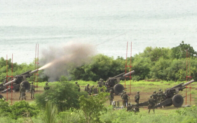 Taiwan's military conducts artillery live-fire drills at Fangshan township in Pingtung, southern Taiwan, Tuesday, Aug. 9, 2022 (AP Photo/Johnson Lai)
