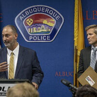 Ahmad Assed, president of the Islamic Center of New Mexico, left, speaks at a news conference to announce the arrest of Muhammad Syed as Albuquerque Mayor Tim Keller listens, at right, August 9, 2022. (Adolphe Pierre-Louis/The Albuquerque Journal via AP)