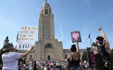 Protesters line the street around the front of the Nebraska State Capitol during an Abortion Rights Rally held on July 4, 2022, in Lincoln, Nebraska. (Kenneth Ferriera/AP)