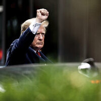 Former President Donald Trump gestures as he departs Trump Tower, August 10, 2022, in New York, on his way to the New York attorney general's office for a deposition in a civil investigation. (AP Photo/Julia Nikhinson)