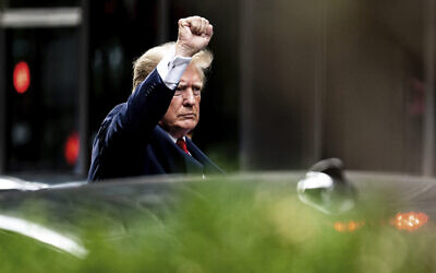 Former President Donald Trump gestures as he departs Trump Tower, August 10, 2022, in New York, on his way to the New York attorney general's office for a deposition in a civil investigation. (AP Photo/Julia Nikhinson)