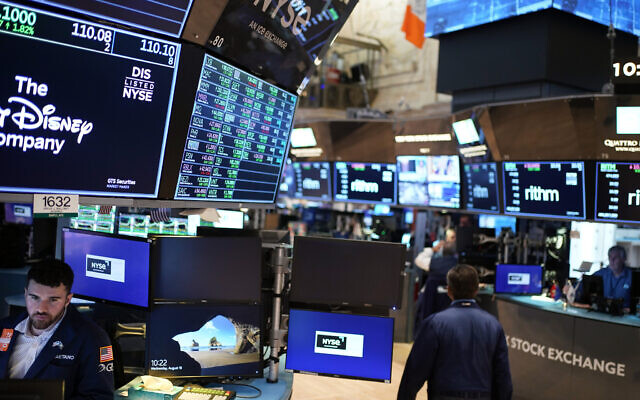 Traders work on the floor at the New York Stock Exchange in New York City, August 10, 2022. (AP/Seth Wenig)