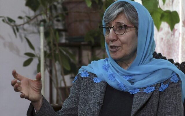 Sima Samar, a prominent activist and physician, who has been fighting for women's rights in Afghanistan for the past 40 years, speaks during an interview at her house in Kabul, Afghanistan, on March 6, 2021, six months before the Taliban takeover of her country. (AP Photo/Rahmat Gul)