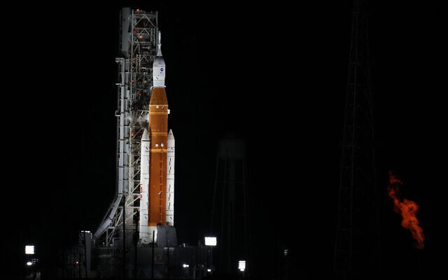 NASA's new moon rocket sits on Launch Pad 39-B hours before liftoff Monday, August 29, 2022, in Cape Canaveral, Florida. (AP Photo/Chris O'Meara) NASA's new moon rocket sits on Launch Pad 39-B hours before liftoff Monday, August 29, 2022, in Cape Canaveral, Florida. (AP Photo/Chris O'Meara)