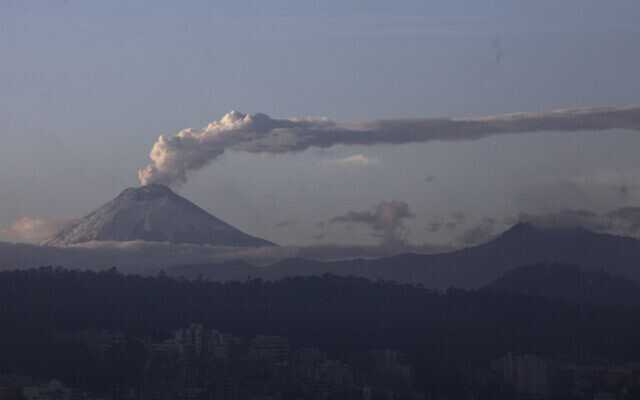 The Cotopaxi volcano spewing ash and vapor is seen from Quito, Ecuador, November 16, 2015. (AP Photo/Dolores Ochoa)