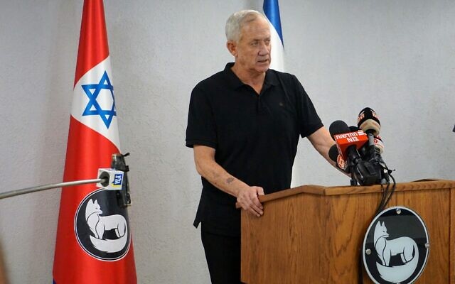 Defense Minister Benny Gantz speaks to reporters at the military's Southern Command HQ in Beersheba, August 5, 2022. (Emanuel Fabian/Times of Israel)