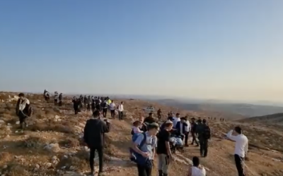Settlers from the ultra-Orthodox illegal outpost of Derech Emunah leave their settlement after it was evacuated and destroyed by border police and Civil Administration personnel in the early hours of Wednesday morning, August 17, 2022. (Screenshot courtesy Derech Emunah residents)