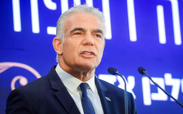 Prime Minister Yair Lapid attends the opening ceremony for a new emergency room at Ichilov Hospital, in Tel Aviv, July 28, 2022. (Avshalom Sassoni/Flash90)