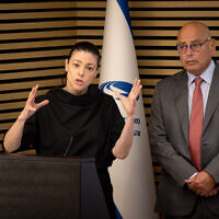 Transportation Minister Merav Michaeli, left, and and National Road Safety Authority chair Avi Naor during a press conference at the Ministry of Transportation in Jerusalem, July 31, 2022. (Yonatan Sindel/Flash90)