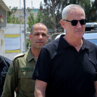 Defense Minister Benny Gantz speaks during a press briefing outside the IDF Southern Command, in the southern Israeli city of Beersheba, on August 5, 2022. (Flash90)