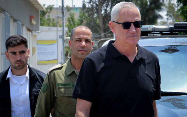 Defense Minister Benny Gantz speaks during a press briefing outside the IDF Southern Command, in the southern Israeli city of Beersheba, on August 5, 2022. (Flash90)