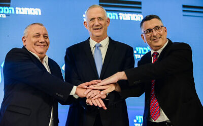 Defense Minister Benny Gantz, head of the National Union alliance, center, withJustice Minister Gideon Saar, right, and Gadi Eizenkot at a press conference in Ramat Gan on August 14, 2022. (Tomer Neuberg/Flash90)