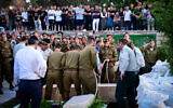 Family and friends attend the funeral of IDF soldier Nathan Fitoussi, who was killed by friendly fire near the West Bank city of Tulkarem, August 16, 2022. (Avshalom Sassoni/Flash90)