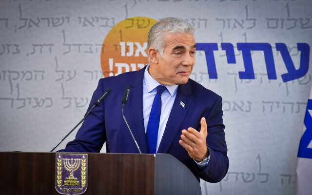 Prime Minister Yair Lapid speaks during a faction meeting in Tel Aviv on August 25, 2022. (Avshalom Sassoni/Flash90)