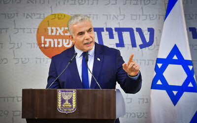 Illustrative: Prime Minister Yair Lapid speaks during a faction meeting in Tel Aviv on August 25, 2022. (Avshalom Sassoni/Flash90)