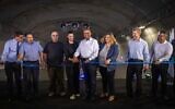 Transportation Minister Merav Michaeli and Jerusalem Mayor Moshe Lion, center, seen during an opening ceremony of Route 16 at the entrance to Jerusalem on August 31, 2022. (Olivier Fitoussi/Flash90)