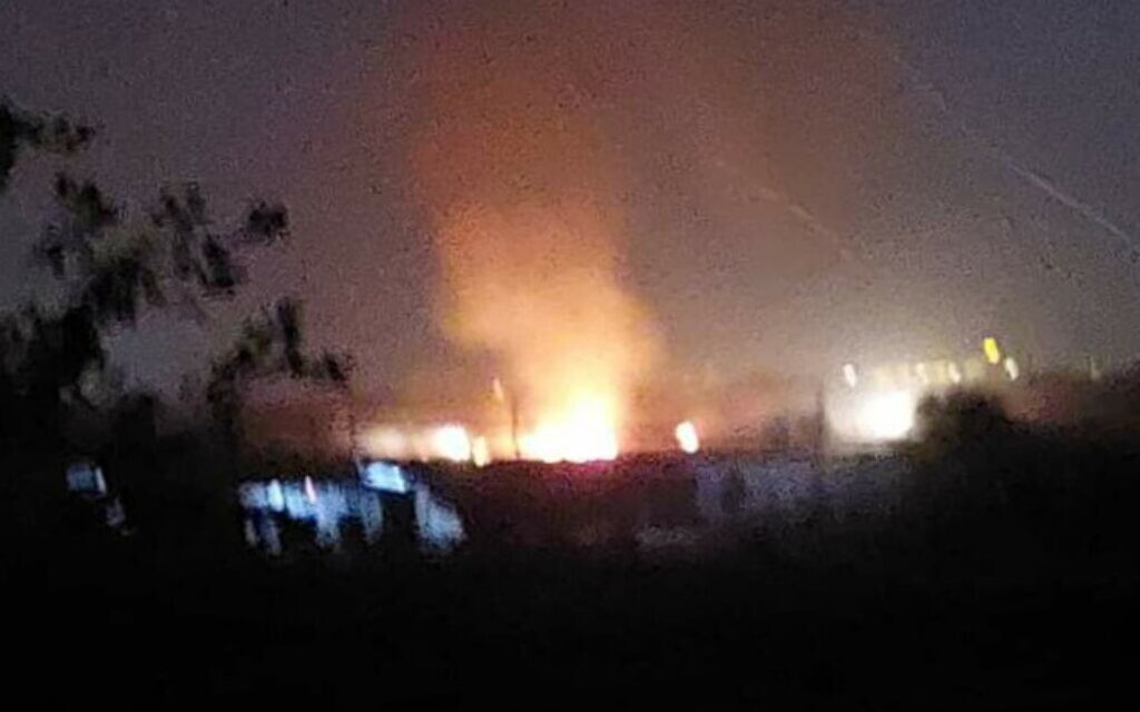 A fire is reportedly seen at the Aleppo International Airport in northern Syria following an airstrike attributed to Israel, August 31, 2022. (Social media)