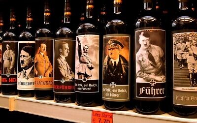 Bottles of Lunardelli Wine with labels depicting Nazi leader Adolf Hitler are displayed on a shelf in a wine shop near Venice, Sept. 12, 2003. (Giuseppe Cacace/Getty Images via JTA)