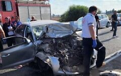 Magen David Adom paramedics at the scene of a car accident at the Be'erotayim Junction in central Israel, August 11, 2022. (Magen David Adom)