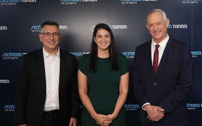 In this handout photo released by National Unity on August 22, 2022, leaders Benny Gantz (R) and Gideon Sa'ar (l) pose with the party's newest member, MK Shirly Pinto (C). (Elad Malka)