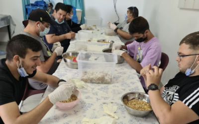 Young people within the Kinneret housing project participate in a practical work experience session. August 2022 (courtesy Kinneret Ltd.)