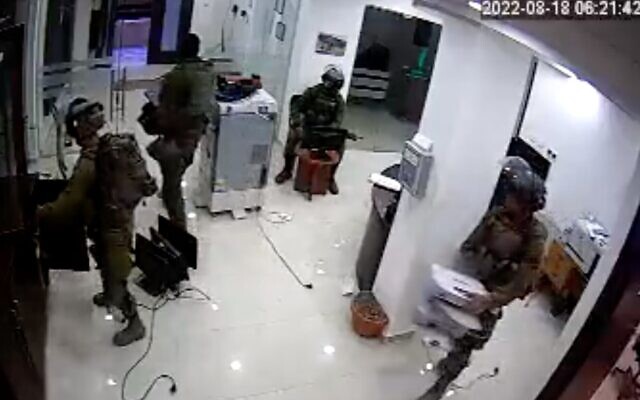 Security camera footage of Israeli troops raiding the offices of Union of Agricultural Work Committees in Ramallah on August 16, 2022. (Screen capture/Twitter)