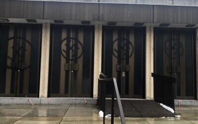 Swastikas were spray-painted on Montreal's Congregation Shaar Hashomayim's front doors, Jan. 13, 2021. (Photo distributed by Friends of Simon Wiesenthal Center via JTA)