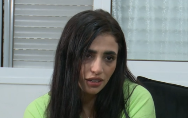 Lamis Abu Laban, 26, who was shot 18 times by masked assailants in Lod in February and miraculously survived, during an interview with Channel 12 that aired on August 3, 2022. (Screenshot/Channel 12)