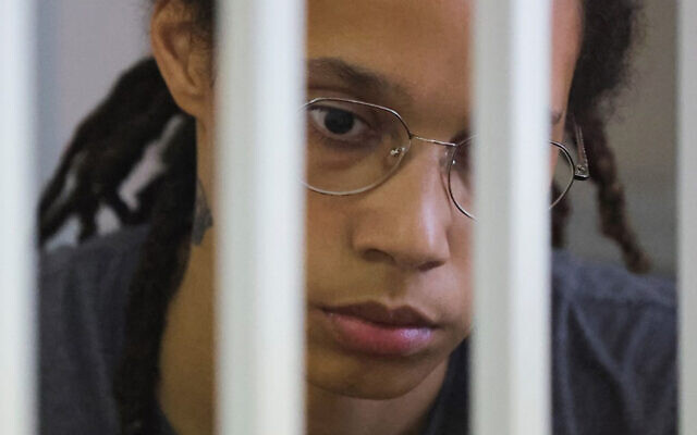 US basketball star Brittney Griner waits for a verdict inside a defendants' cage during a hearing in Khimki, outside Moscow, on August 4, 2022. (Evgenia 
Novozhenina/Pool/AFP)