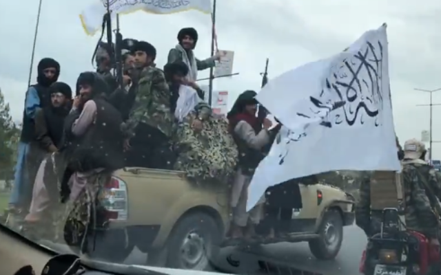 Taliban fighters hold a parade in Kabul, marking one year since taking over the Afghan capital. (video screenshot)