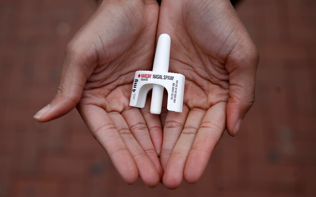 A worker from the Baltimore City Health Department displays a sample of Narcan in Baltimore, Maryland, January 23, 2018. (AP Photo/Patrick Semansky, File)