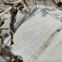 A damaged Jewish grave is seen at the Jewish cemetery in the city of Aden in southern Yemen. (Twitter/Kan News)