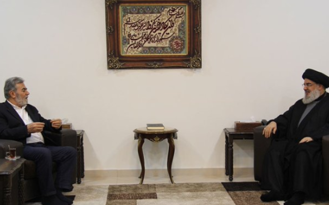 Hezbollah leader Hassan Nasrallah (right) and Palestinian Islamic Jihad chief Ziyad Nakhaleh meet in Lebanon, August 24, 2022. (Twitter)