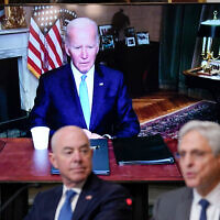 US President Joe Biden listens virtually as Attorney General Merrick Garland, right, speaks during the first meeting of the interagency Task Force on Reproductive Healthcare Access on the White House Campus in Washington, August 3, 2022. Homeland Security Secretary Alejandro Mayorkas looks on. (AP Photo/Susan Walsh)