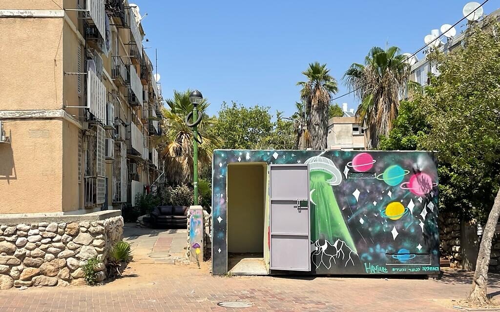 A painted mini-shelter outside of an apartment building in Ashkelon, August 7, 2022. (Carrie Keller-Lynn  / The Times of Israel)