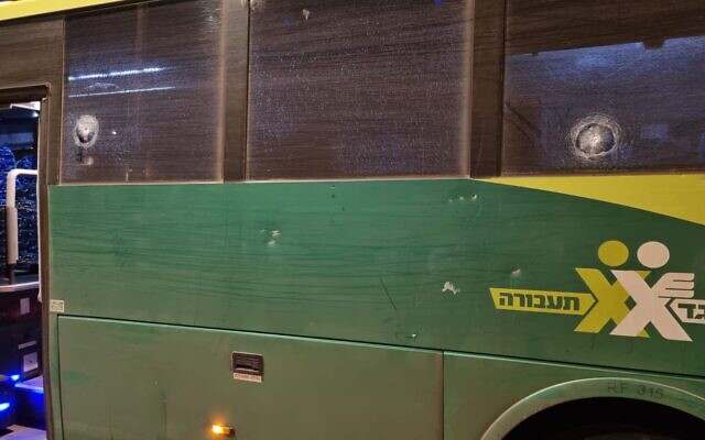 An Israeli bus is seen damaged following a shooting attack in the West Bank near Silwad, August 20, 2022. (Courtesy)