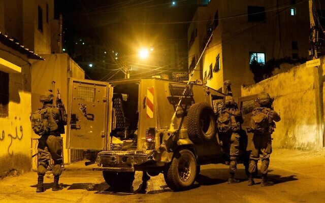 Illustrative: IDF soldiers carry out raids in the West Bank on August 18, 2022. (Israel Defense Forces)