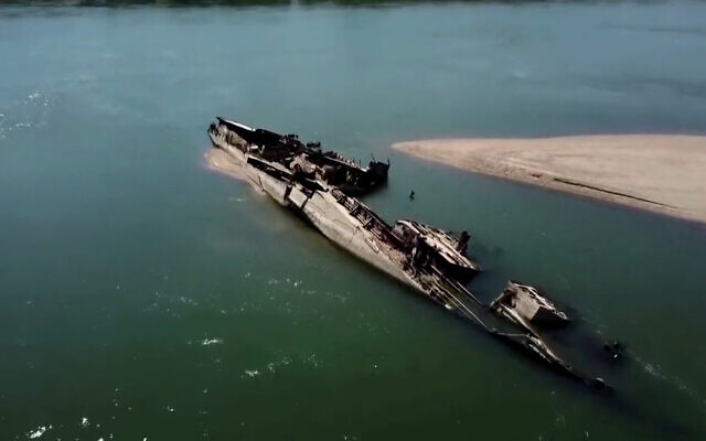 A World War II-era German warship is seen in the Danube River in Serbia, August 19, 2022. (Video screenshot: Twitter)