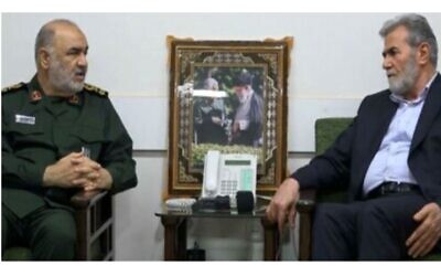 Head of Iran's Islamic Revolutionary Guard Corps (L) meets in Tehran with Palestinian Islamic Jihad's general-secretary Ziad Nakhaleh, August 6, 2022.