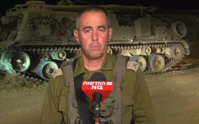Brig. Gen. Nimrod Aloni speaks to Channel 12 news near the border with the Gaza Strip, August 4, 2022. (Screengrab)